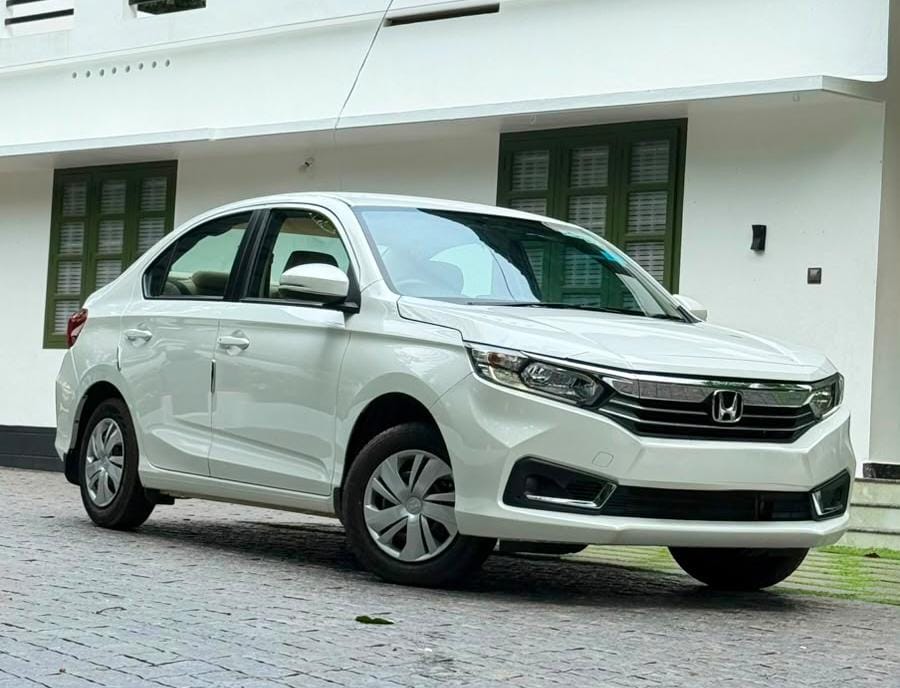 Comfort Sedan taxi for city and airport rides in Kerala