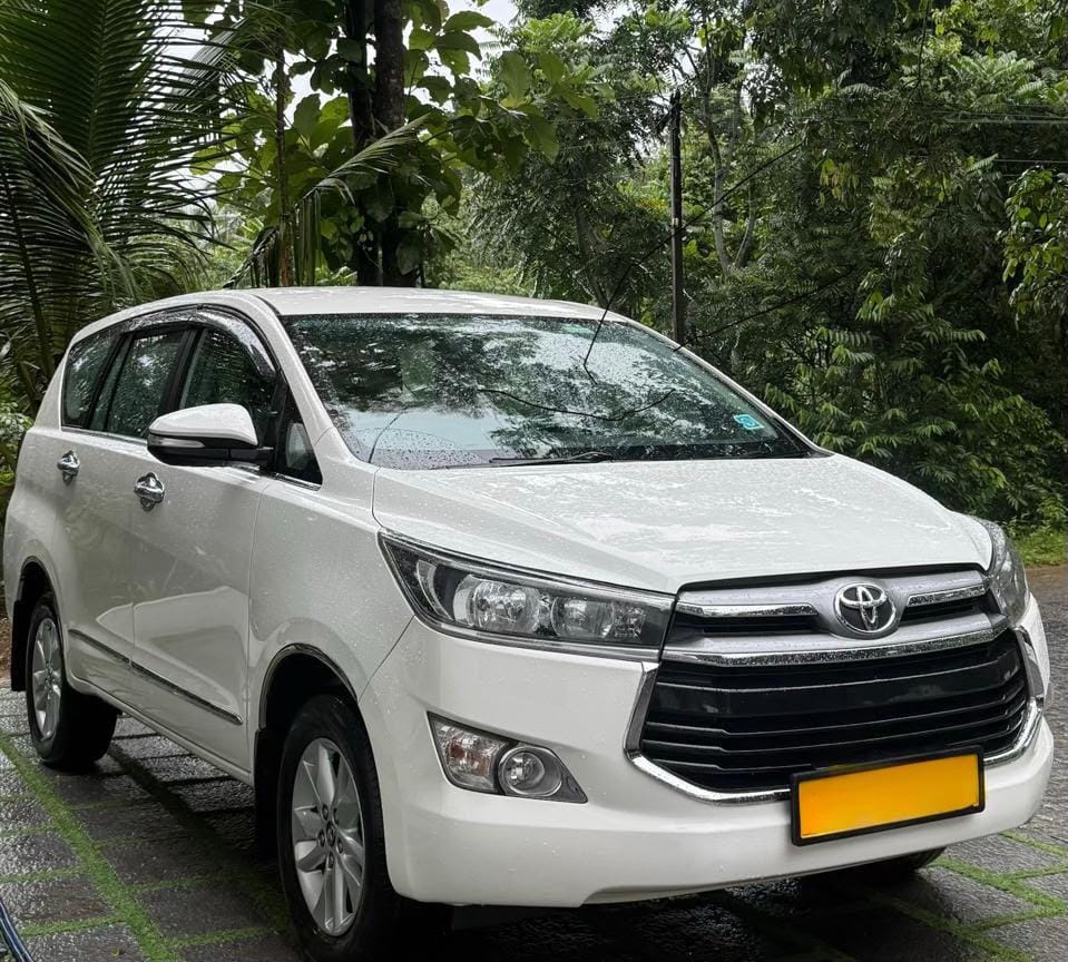 Family SUV taxi for group travel in Kerala